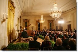 President George W. Bush, Mrs. Laura Bush and guests listen to the evening's entertainment at the White House, Thursday, Nov. 10, 2005, following the dinner celebrating the 40th Anniversary of the National Endowment for the Arts and the National Endowment for the Humanities.  White House photo by Paul Morse