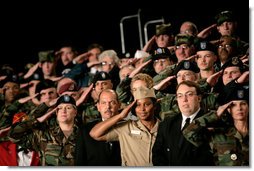 Staff and Army personnel welcome President George W. Bush, during his introduction, Friday, Nov. 11, 2005 at the Tobyhanna Army Depot in Tobyhanna, Pa.  White House photo by Eric Draper