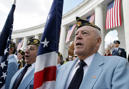 Veteran Dewey Lowman of Post 109 in Halethorpe, Md., right, is seen Friday, Nov. 11, 2005, during Veterans Day ceremonies at Arlington National Cemetery in Arlington, Va. White House photo by David Bohrer