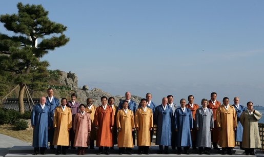 Leaders of the Asian Pacific Economic Cooperation stand for the official 2005 APEC photograph Saturday, Nov. 19, 2005, at the Nurimaru APEC house in Busan, Korea. The photograph came on the final day of the two-day economic summit. White House photo by Paul Morse