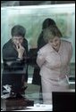 Laura Bush and Lisa Vershbow, left, wife of Alexander Vershbow, the U.S. Ambassador to Korea, look at exhibits at the Busan Museum Saturday, Nov. 19, 2005, in Busan, Korea. White House photo by Shealah Craighead