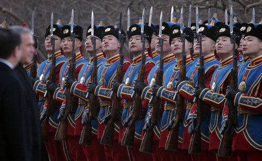 President Bush and Mongolia President Nambaryn Enkhbayar review Mongolia troops Monday, Nov. 21, 2005, as President and Mrs. Bush arrived in Ulaanbaatar on the final stop of their 7-day Asia trip. White House photo by Paul Morse