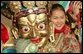 A participant in the cultural event for President and Mrs. Bush stands unmasked for photos Monday, Nov. 21, 2005, in Ikh Tenger, Mongolia. White House photo by Paul Morse