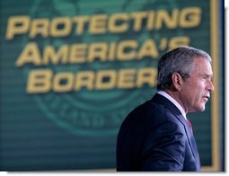 President George W. Bush addresses an audience Monday, Nov. 28, 2005 at the Davis-Monthan Air Force Base in Tucson, Arizona, on the importance of border security and the issue of immigration reform.  White House photo by Eric Draper