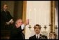 President George W. Bush participates in the Menorah lighting at the White House with Rabbi Joshua Skoff and members of the Skoff family, Tuesday, Dec. 6, 2005, prior to the annual White House Hanukkah reception. White House photo by Kimberlee Hewitt