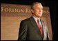 President George W. Bush is introduced at a meeting of the Council on Foreign Relations, Wednesday, Dec. 7, 2005 in Washington, where he spoke on the war on terror and the rebuilding of Iraq. White House photo by Paul Morse