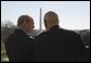 President George W. Bush shares a quiet moment on the balcony with Rep. John Dingell (D-Mich.) during the senior Democrat's visit to the White House Tuesday, Dec. 13, 2005, to mark his 50th anniversary in Congress. White House photo by Paul Morse