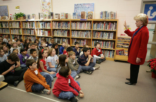 Mrs. Cheney holds up her finger as she describes to students at W.W. Burrows Elementary School in Quantico the procedure for casting votes in the upcoming parliamentary elections in Iraq and its importance. Mrs. Cheney spoke to the kids Tuesday, Dec. 13, 2005, on the U.S. Marine Corps base. White House photo by David Bohrer