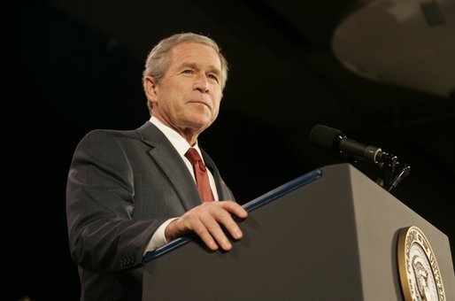 President Bush acknowledges applause during his remarks on the War on Terror Wednesday, Dec. 14, 2005, at the Woodrow Wilson International Center for Scholars in Washington D.C. Speaking of this week's elections in Iraq, President Bush told the audience, "We are living through a watershed moment in the story of freedom." White House photo by Kimberlee Hewitt