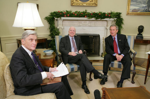 President George W. Bush meets with U.S. Senator John McCain, R-Ariz., and U.S. Senator John Warner, R-Va., Thursday, Dec. 15, 2005 in the Oval Office, to discuss the U.S. position on the interrogation of prisoners. White House photo by Paul Morse