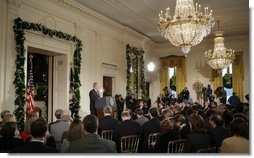 Reporters gather in the East Room of the White House Monday, Dec. 19, 2005, for the President's press conference. The President reiterated his constitutional responsibility and his constitutional authority to protect the country.  White House photo by Paul Morse