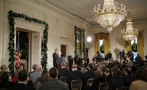 Reporters gather in the East Room of the White House Monday, Dec. 19, 2005, for the President's press conference. The President reiterated his constitutional responsibility and his constitutional authority to protect the country. White House photo by Paul Morse