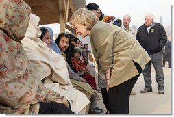 Vice President Dick Cheney and Mrs. Lynne Cheney greet Pakistani patients awaiting care at the 212th M.A.S.H. Unit near the earthquake's epicenter Tuesday, Dec. 20, 2005.  White House photo by David Bohrer