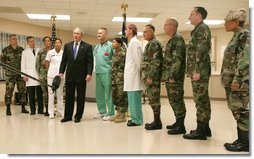 President George W. Bush speaks with the press on Sunday, January 1, 2006, at Brooke Army Medical Center in San Antonio, TX. During his visit to the Medical Center, the President presented nine soldiers with a Purple Heart Award and visited with wounded soldiers and their families.  White House photo by Shealah Craighead