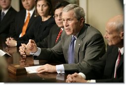 President George W. Bush meets with administration official and U. S. Attorneys to talk about the use and reauthorization of the PATRIOT Act in the Roosevelt Room Tuesday, Jan. 3, 2006. "This Patriot Act was passed overwhelmingly by the United States Congress in 2001," said the President in his remarks to the press. "Members from both parties came together and said we will give those on the front line of protecting America the tools necessary to protect American citizens, and at the same time, guard the civil liberties of our citizens." White House photo by Eric Draper