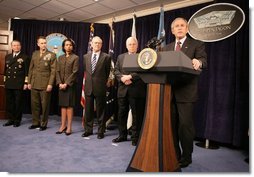 President George W. Bush gestures as he addresses his remarks on the global war on terror, Wednesday, Jan. 4, 2006, to an audience at the Pentagon, following a Department of Defense briefing with Vice President Dick Cheney, Secretary of Defense Donald Rumsfeld, Secretary of State Condoleezza Rice, General Peter Pace, Chairman of the Joint Chiefs of Staff and Admiral Ed Giambastiani, Vice Chairman of the Joint Chiefs of Staff.  White House photo by David Bohrer