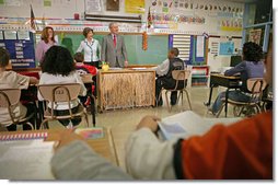 President George W. Bush and Mrs. Laura Bush visit students at North Glen Elementary School in Glen Burnie, Md., Monday, Jan. 9, 2006. "It is a really important piece of legislation that is working. And I'm here today to talk about the spirit of the No Child Left Behind Act, the evidence that says it's working, and my deep desire to work with Congress to make sure it continues to have the desired effect on children all across the country," said the President during his remarks. White House photo by Kimberlee Hewitt