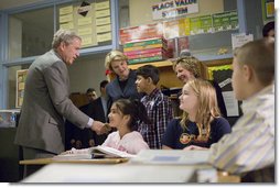 President George W. Bush and Education Secretary Margaret Spellings visit with students at North Glen Elementary School in Glen Burnie, Md., Monday, Jan. 9, 2006. "This is a fine school," said the President in his remarks about 'No Child Left Behind' at the school. "We're here to herald excellence. We're here to praise the law that is working. I'm here to thank the teachers, not only here, but around the state of Maryland and around the country, who are dedicating their lives to providing hope for our future." White House photo by Kimberlee Hewitt