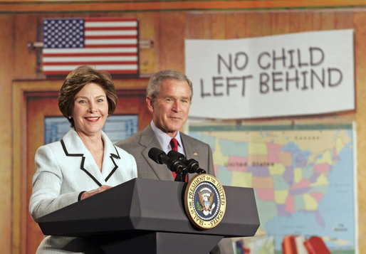 Laura Bush and President Bush discuss “No Child Left Behind,” at North Glen Elementary School in Glen Burnie, Md., Monday, Jan. 9, 2006. “Interestingly enough, in 2003, 45 percent of the African American students in this school rated proficient in reading; in 2005, 84 percent are proficient. In other words, this is a school that believes every child can learn. Not just certain children, every child,” said the President. White House photo by Kimberlee Hewitt