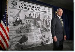 President George W. Bush steps on stage to address members of the Veterans of Foreign Wars about achieving victory in Iraq in Washington, D.C., Jan. 10, 2006. "History has shown that free nations are peaceful nations," said the President. "And by helping Iraqis build a lasting democracy, we spread the hope of liberty across a troubled region, we will gain new allies in the cause of freedom. By spreading democracy and freedom, we're laying the foundation of peace for generations to come."  White House photo by Paul Morse