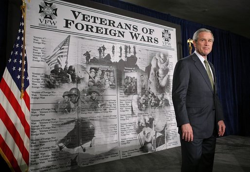 President George W. Bush steps on stage to address members of the Veterans of Foreign Wars about achieving victory in Iraq in Washington, D.C., Jan. 10, 2006. "History has shown that free nations are peaceful nations," said the President. "And by helping Iraqis build a lasting democracy, we spread the hope of liberty across a troubled region, we will gain new allies in the cause of freedom. By spreading democracy and freedom, we're laying the foundation of peace for generations to come." White House photo by Paul Morse