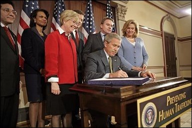 President George W. Bush signs H.R. 972, the Trafficking Victims Protection Reauthorization Act of 2005.