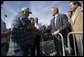 President George W. Bush greets first responders in Waveland, Miss., Thursday, Jan. 12, 2006. White House photo by Eric Draper