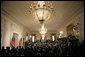 The East Room of the White House is filled as President George W. Bush and German Chancellor Angela Merkel deliver remarks during a joint press availability Friday, Jan. 13, 2006. White House photo by Eric Draper