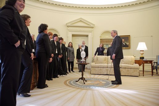 President George W. Bush hosts a visit to the Oval Office by the 2005 U.S. Solheim Cup Team Friday, Jan. 13, 2006. The Solheim Cup is a biennial competition between the top United States and Europe's women golfers. White House photo by Paul Morse