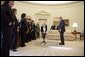 President George W. Bush hosts a visit to the Oval Office by the 2005 U.S. Solheim Cup Team Friday, Jan. 13, 2006. The Solheim Cup is a biennial competition between the top United States and Europe's women golfers. White House photo by Paul Morse