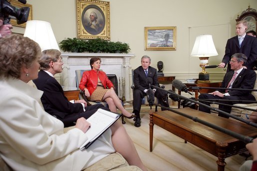 President George W. Bush meets with business leaders to discuss Central American Relief and Reconstruction Efforts in the Oval Office Friday, Jan. 13, 2006. From left, they are: Robert Lane of Deer & Co., Maria Elena Lagomasino of Asset Management Advisors, LLC., and Steve Reinmund of PepsiCo. Under Secretary of State Karen Hughes is pictured at the far left. White House photo by Paul Morse