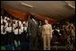 Mrs. Laura Bush and Ghana President John Agyekum Kufuor appear together at the launch of the Africa Education Initiative Textbooks Program Tuesday, Jan. 17, 2006 in Accra, Ghana. White House photo by Shealah Craighead