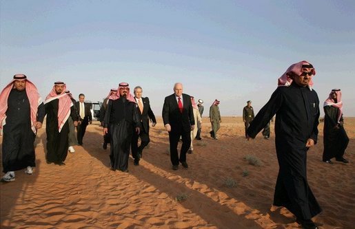 Vice President Dick Cheney and King Abdullah make their way through Saudi sands on the way to the King's desert camp outside Riyadh, Tuesday January 17, 2006. White House photo by David Bohrer