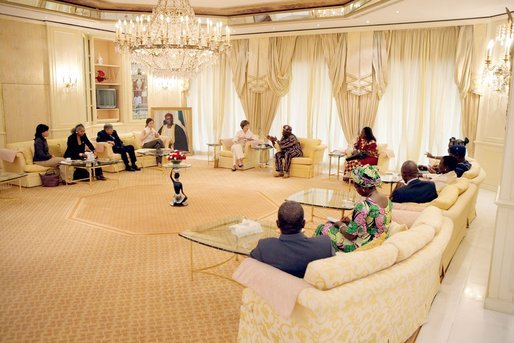 Mrs. Laura Bush is joined by daughter Barbara as they visit with Nigeria President Olusegun Obasanjo Wednesday, Jan. 18, 2006, at the presidential villa in Abuja, Nigeria. The visit came on the last day of a four-day visit to West Africa. White House photo by Shealah Craighead