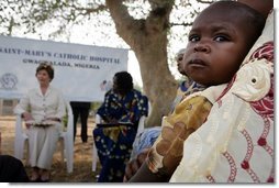 Mrs. Bush sits outside at Saint-Mary's Catholic Hospital in Gwagwalada, Nigeria Wednesday, Jan. 18, 2006, where she announced a $163 million commitment by the United States to Nigeria to battle AIDS.  White House photo by Shealah Craighead