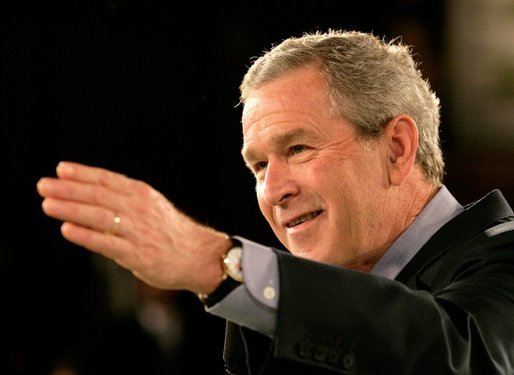 President George W. Bush takes a question from the audience during a discussion about the economy at JK Moving and Storage in Sterling, Va., Thursday, Jan. 19, 2006. White House photo by Eric Draper