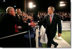 President George W. Bush greets the audience following his remarks on the economy at JK Moving and Storage in Sterling, Va., Thursday, Jan. 19, 2006.  White House photo by Eric Draper