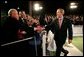 President George W. Bush greets the audience following his remarks on the economy at JK Moving and Storage in Sterling, Va., Thursday, Jan. 19, 2006. White House photo by Eric Draper