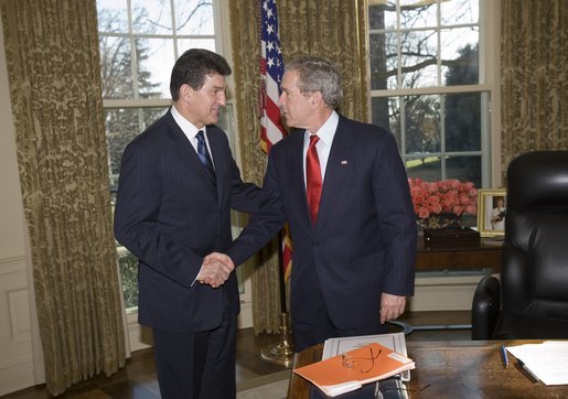 President George W. Bush meets West Virginia Governor Joe Manchin in the Oval Office, Tuesday, Jan. 24, 2006. After 14 coal mining deaths in West Virginia in three weeks, Gov. Manchin's legislative proposals to improve mine safety has been passed by the West Virginia Senate unanimously. White House photo by Eric Draper