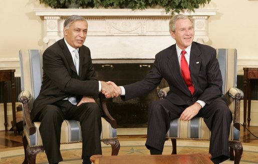 President George W. Bush welcomes Pakistan Prime Minister Shaukat Aziz to the Oval Office, Tuesday, Jan. 24, 2006. White House photo by Kimberlee Hewitt