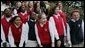 Youngsters from the Cathedral Church of St. John react as they watch the arrival of Marine One to the South Lawn of the White House with President George W. Bush aboard Wednesday, Jan. 25, 2006. White House photo by Paul Morse