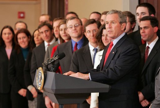 President George W. Bush stands with former law clerks of Judge Samuel Alito as he delivers a statement in the Dwight D. Eisenhower Executive Office Building Wednesday, Jan. 25, 2006. "All these brilliant legal minds are united in their strong support of Sam Alito, And in his confirmation hearings, the American people saw why. Judge Alito is open-minded and principled," said the President. "He gives every case careful attention, and he makes decisions based on the merits. Judge Alito understands that the role of a judge is to interpret the law, not to advance a personal or political agenda." White House photo by Paul Morse