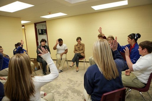 Laura Bush and U.S. Secretary of Education Margaret Spellings meet with staff and students Wednesday, Jan. 26, 2006 at the St. Bernard Unified School in Chalmette, La. Students raise their hands to acknowledge that their families lost everything in the storms of Hurricane Katrina. White House photo by Shealah Craighead