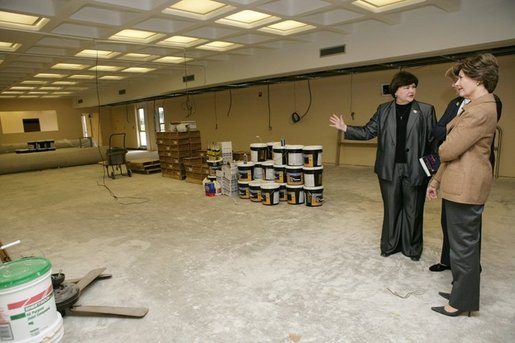 Laura Bush and U.S. Secretary of Education Margaret Spellings are shown the repairs being made at the St. Bernard Unified School in Chalmette, La., Wednesday, Jan. 26, 2006 by school superintendent Doris Voitier, which was damaged by Hurricane Katrina. White House photo by Shealah Craighead