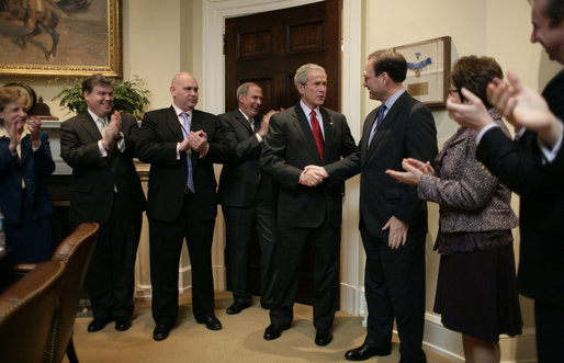 President George W. Bush shakes hands with Judge Samuel A. Alito in the Roosevelt Room of the White House Tuesday, Jan. 31, 2006, after the Senate voted to confirm Judge Alito as the 110th Justice of the Supreme Court. Looking on, from left, are: Harriet Miers, Counsel to the President; Bill Kelley, Deputy Counsel to the President; Steve Schmidt, Deputy Assistant to the President and former Senator Dan Coats (R-Ind.). At right are Mrs. Martha Ann Alito and Ed Gillespie. White House photo by Eric Draper