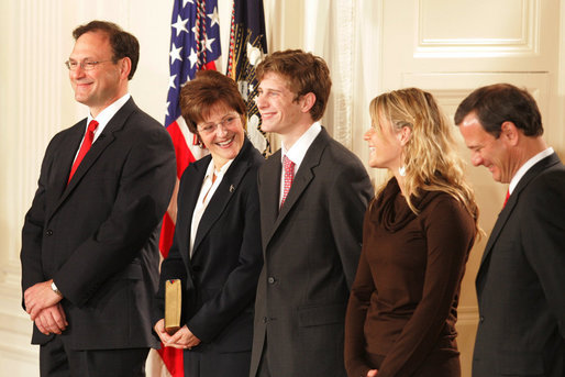 U.S. Supreme Court Justice Samuel A. Alito is seen, Tuesday, Feb. 1, 2006 in the East Room of the White House, with his wife, Martha-Ann, their son Phil, daughter, Laura, and U.S. Supreme Court Chief Justice John Roberts prior to being sworn-in. White House photo by Shealah Craighead