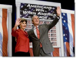 President George W. Bush and Mrs. Bush wave to the audience following the President's remarks on the 2006 agenda, Wednesday, Feb. 1, 2006 at the Grand Ole Opry House in Nashville.  White House photo by Eric Draper