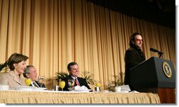 President George W. Bush, Laura Bush and Sen. Mark Pryor (D-Ark.) break out in laughter as Bono speaks during the National Prayer Breakfast Thursday morning at the Hilton Washington Hotel. White  White House photo by Paul Morse