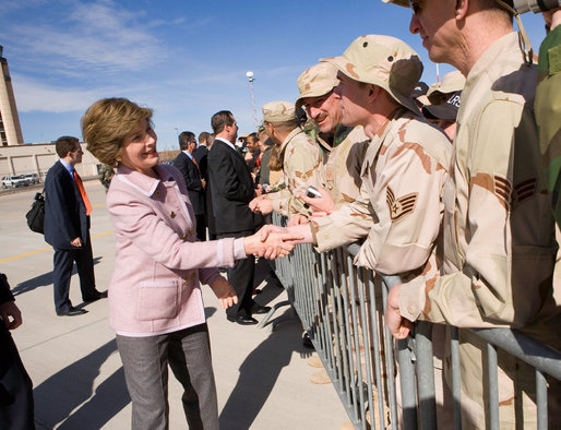 Mrs. Laura Bush greets base personnel from Kirtland Air Force Base Friday, Feb. 3, 2006, before departing Albuquerque for Dallas. White House photo by Eric Draper