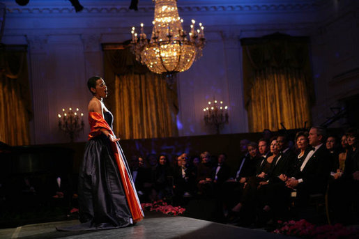 President George W. Bush and Laura Bush listen to soprano Harolyn Blackwell perform in the East Room of the White House during a dinner in honor of The Dance Theatre of Harlem Monday, February 6, 2006. White House photo by Shealah Craighead